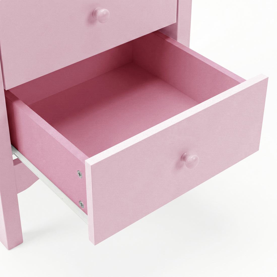 Open drawer of pink two-drawer bedside table showing interior space and round knob detail