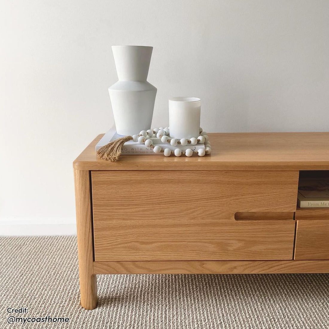 Daphne 200cm American Oak and Timber Entertainment Unit Natural showcasing sleek design, curved corners, prominent wood grains, and spacious storage with swing doors, open shelves, and drawers.