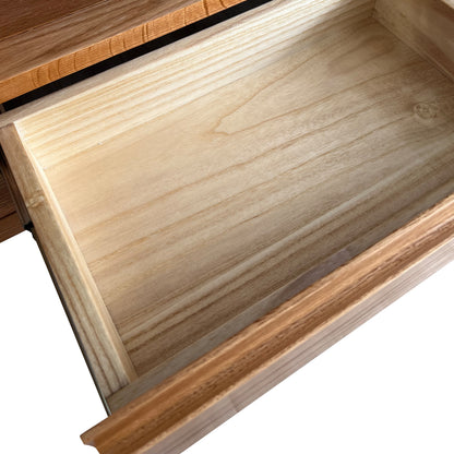 Daphne 200cm American Oak and Timber Entertainment Unit Natural showcasing sleek, curved lines, distinct wood grain patterns, and ample storage with cable holes, crafted from robust North American oak wood.