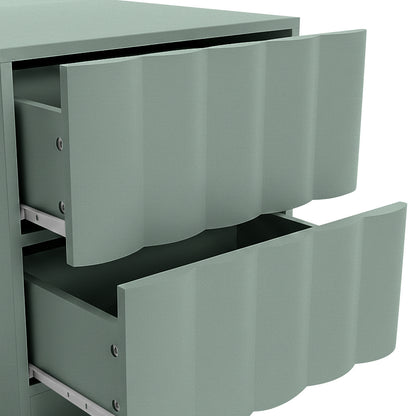 Hamish 2 drawer fluted bedside table in sage with curved drawer fronts and metal runners, top drawer partially open
