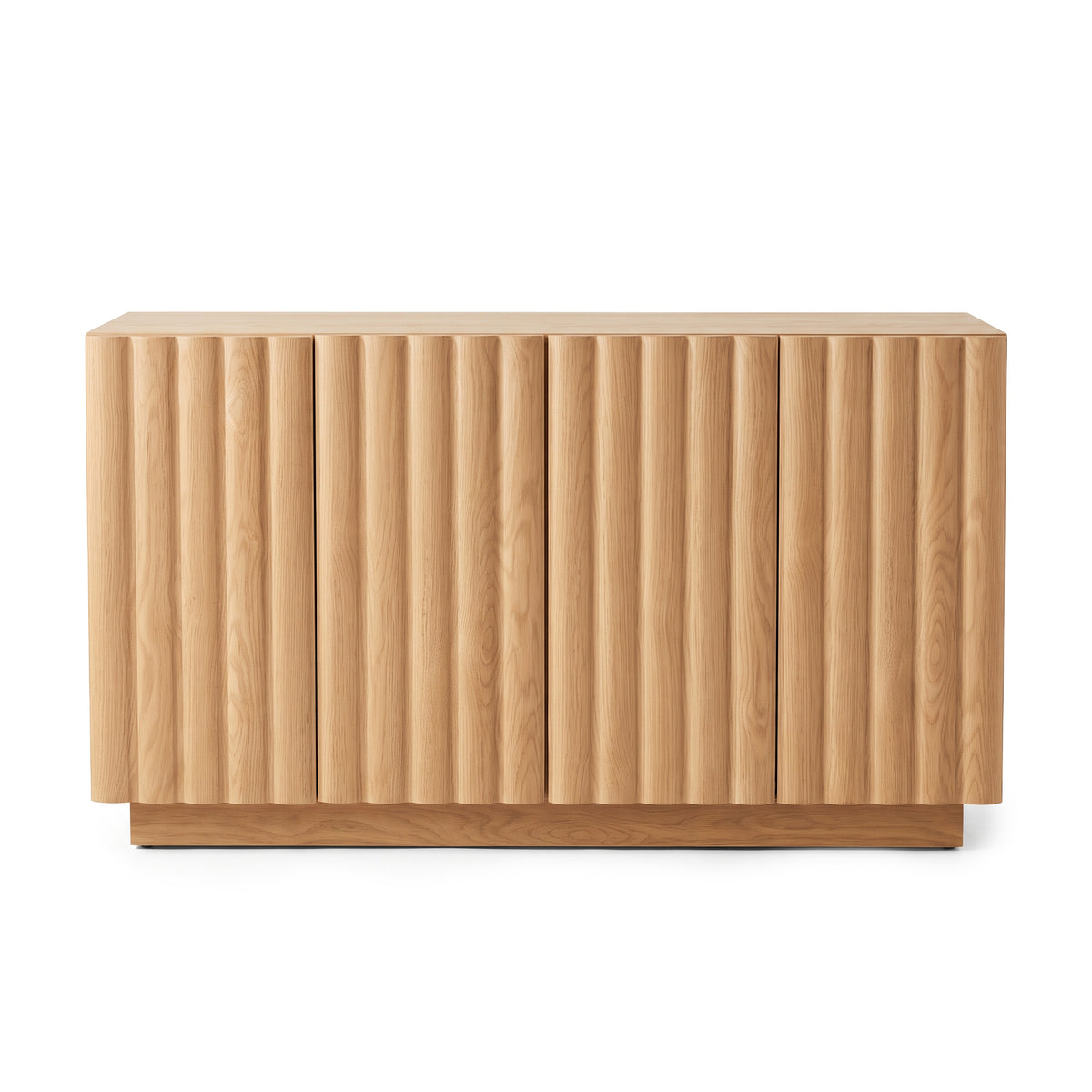 Oak sideboard featuring vertical fluted door panels and a low plinth base against a plain white studio background.