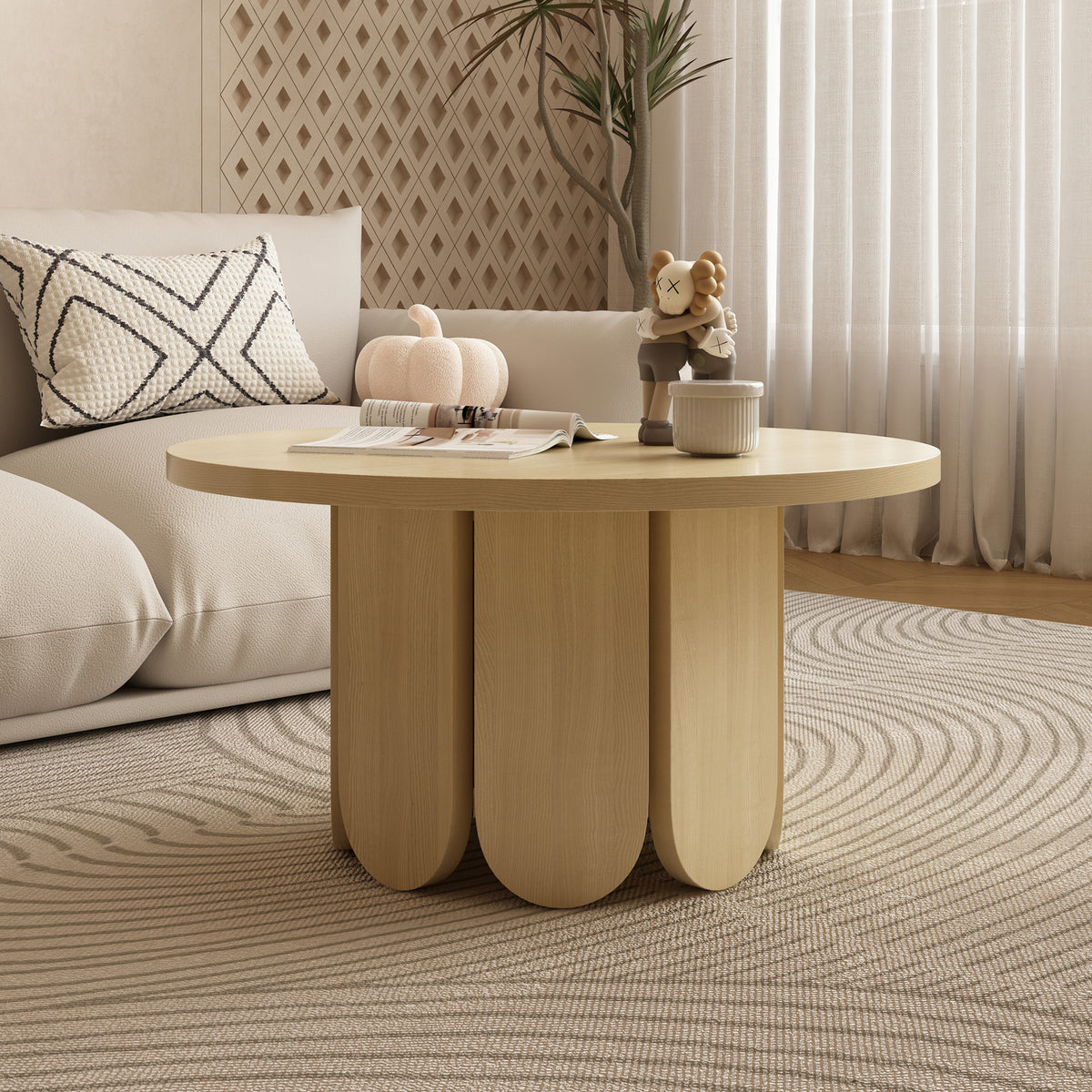 Hugo 70cm round coffee table in natural wood finish with three curved pedestal legs