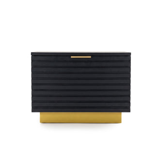 Modern black storage cabinet with gold handle and base on white background