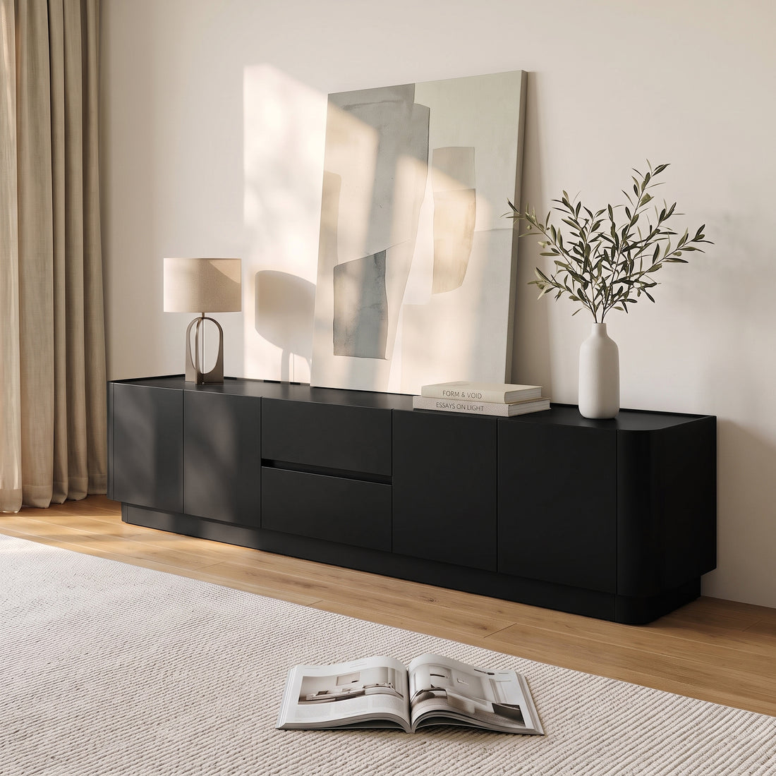 Black media console in a styled living room