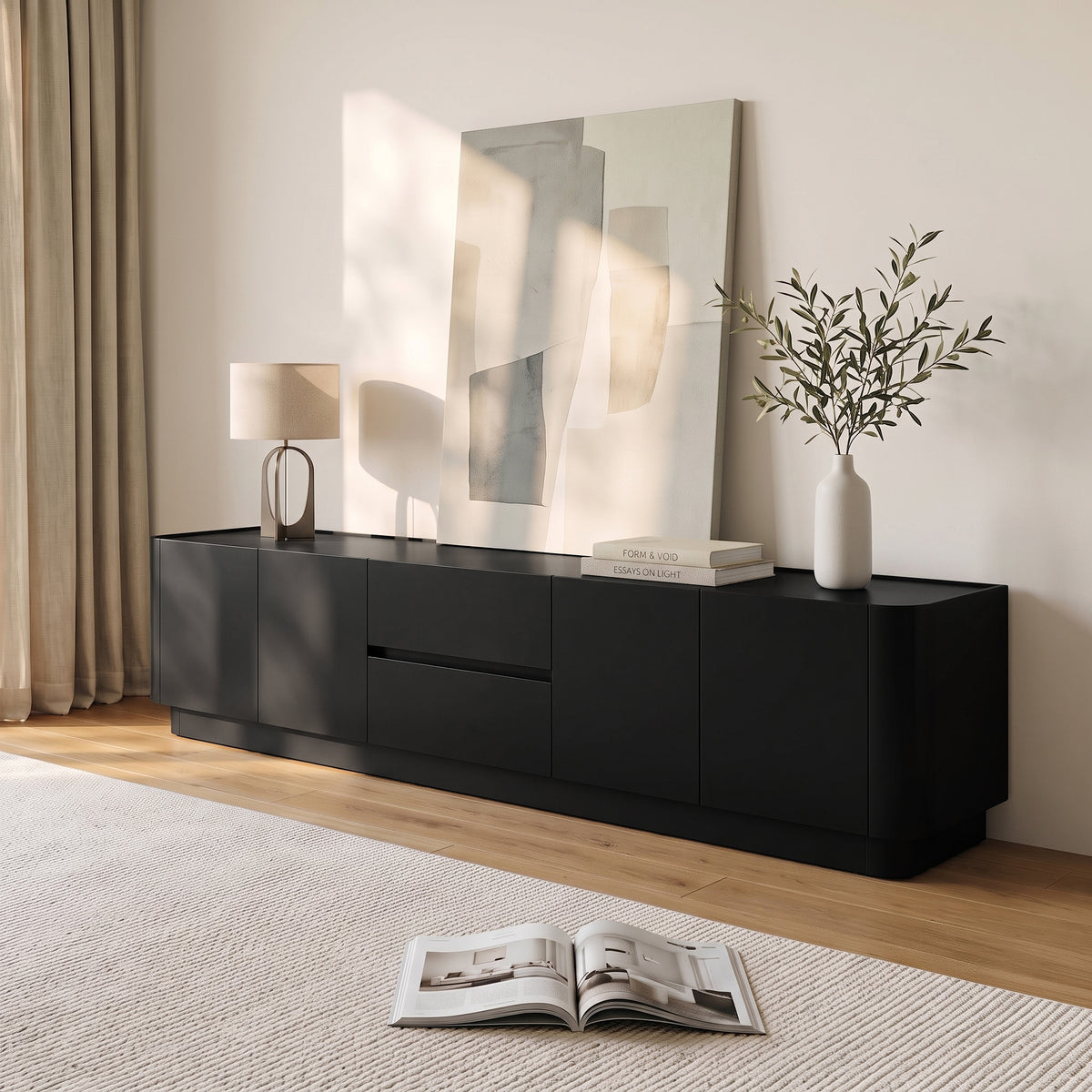 Black media console in a styled living room