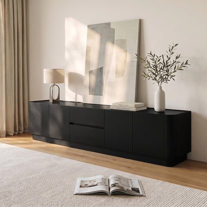 Black media console in a styled living room