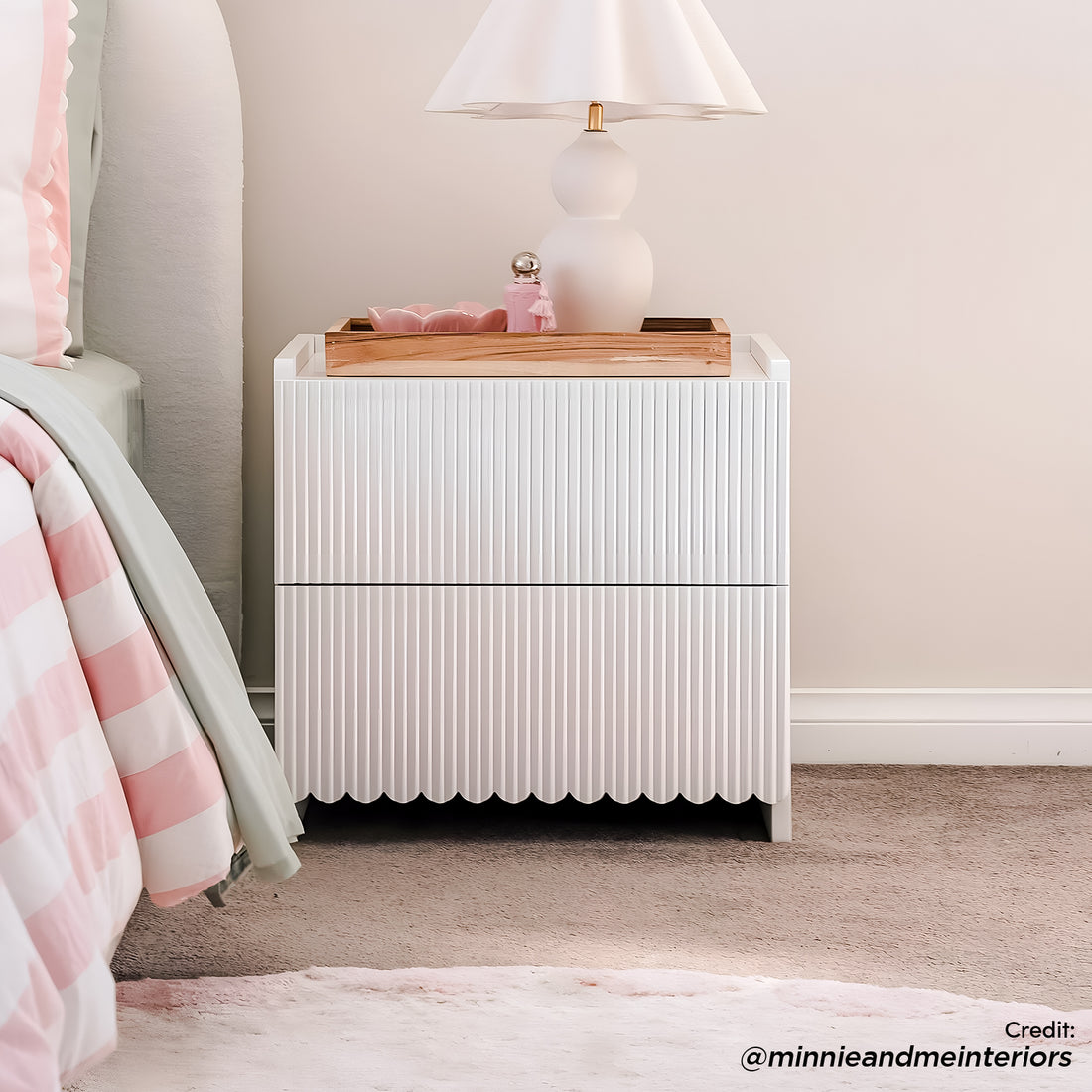 Nasrin 2 Drawer Bedside Table in White with vertical ribbed drawer fronts, scalloped base, and low-lip top surface