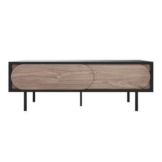 Novia 120cm Coffee Table with Sliding Doors in Black features a modern design with slim black metal legs and light-stained wood panels with elongated ovals, ideal for stylish living room storage.