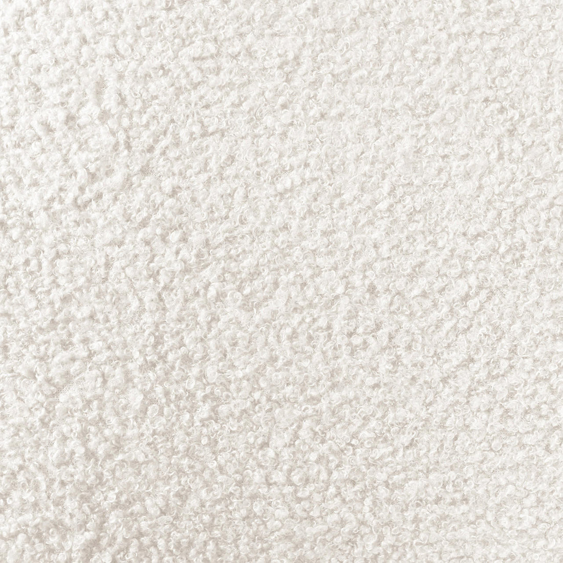 Close-up of the Shona Upholstered Boucle Bedside Table in Cream White, showcasing its plush boucle fabric with tiny curled fibers, reflecting its luxurious texture and modern elegance.