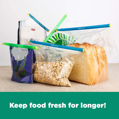 6pcs Sealing Sticks Reusable Clips Bag Sealer in Blue Green, securing food-storage bags with sliced bread and oats, demonstrating their effectiveness in maintaining freshness and minimizing waste.