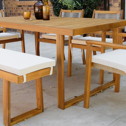 Close-up of the Albian 7 Seater Hardwood Outdoor Dining Set showing the rectangular timber table with beige cushioned chairs