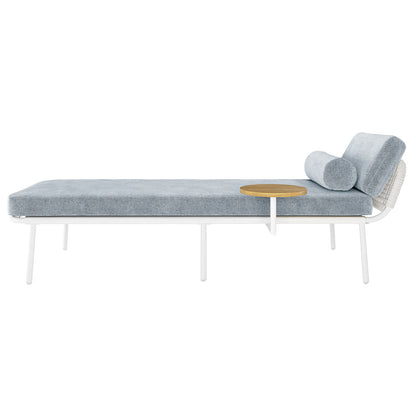 Andre Wicker Outdoor Sun Lounger with Cushion in Light Grey features a white metal frame, light blue-gray cushion, cylindrical pillow, and a round wooden side table.