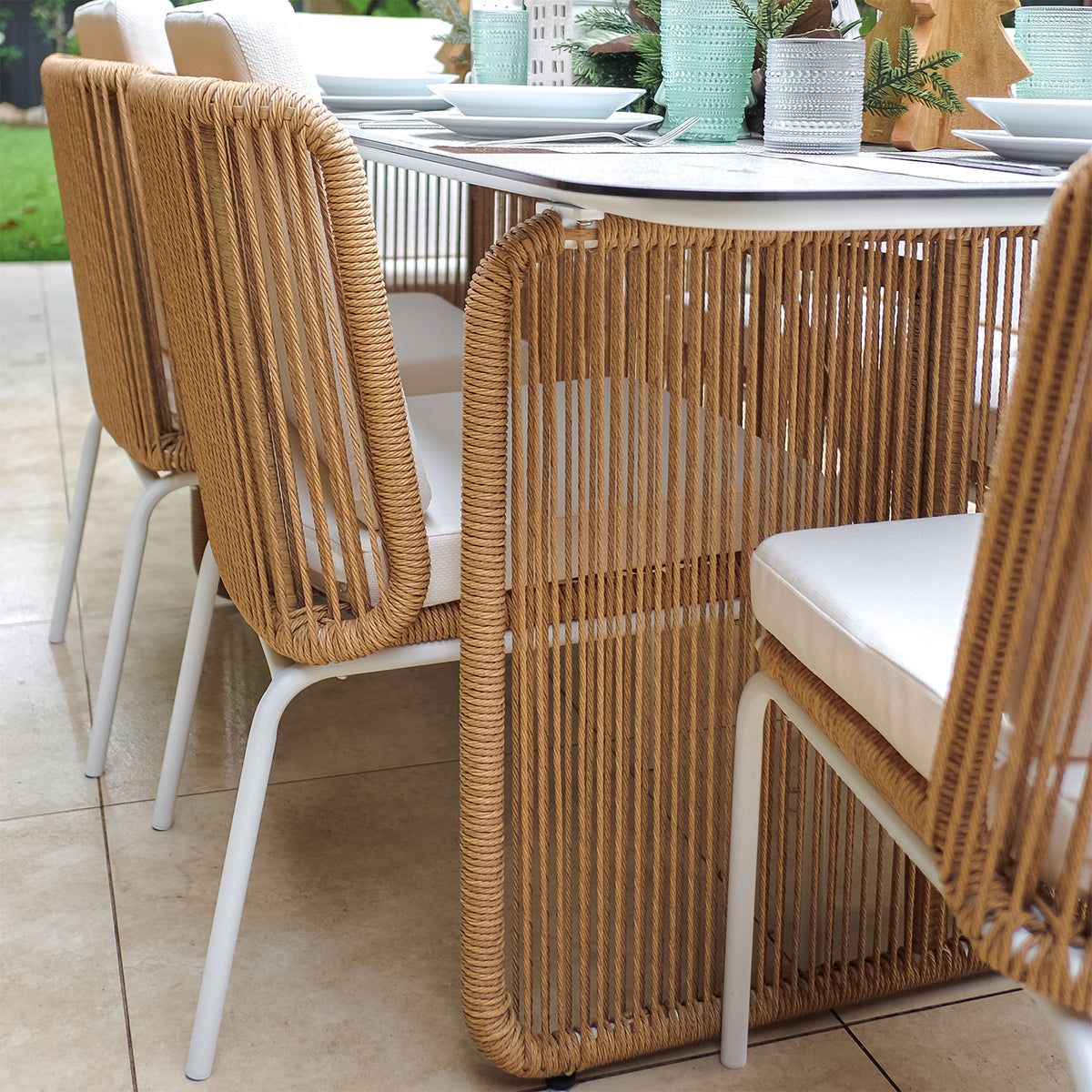 Close-up of the Craigie Premium 6-Seater Outdoor Dining Set's ceramic glass tabletop, showcasing its marble-like pattern. The image highlights the table's elegant design and durable, easy-to-clean surface.