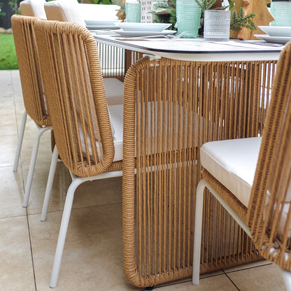 Close-up of the Craigie Premium 6-Seater Outdoor Dining Set's ceramic glass tabletop, showcasing its marble-like pattern. The image highlights the table's elegant design and durable, easy-to-clean surface.
