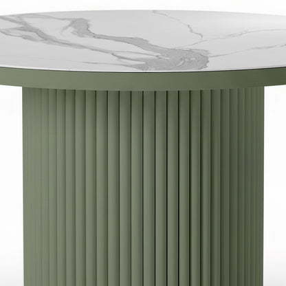 Evone Aluminium Outdoor Dining Table in Green, featuring a round, fluted, cylindrical base with a white, marble-look tabletop showcasing subtle gray veining, designed for outdoor durability and style.
