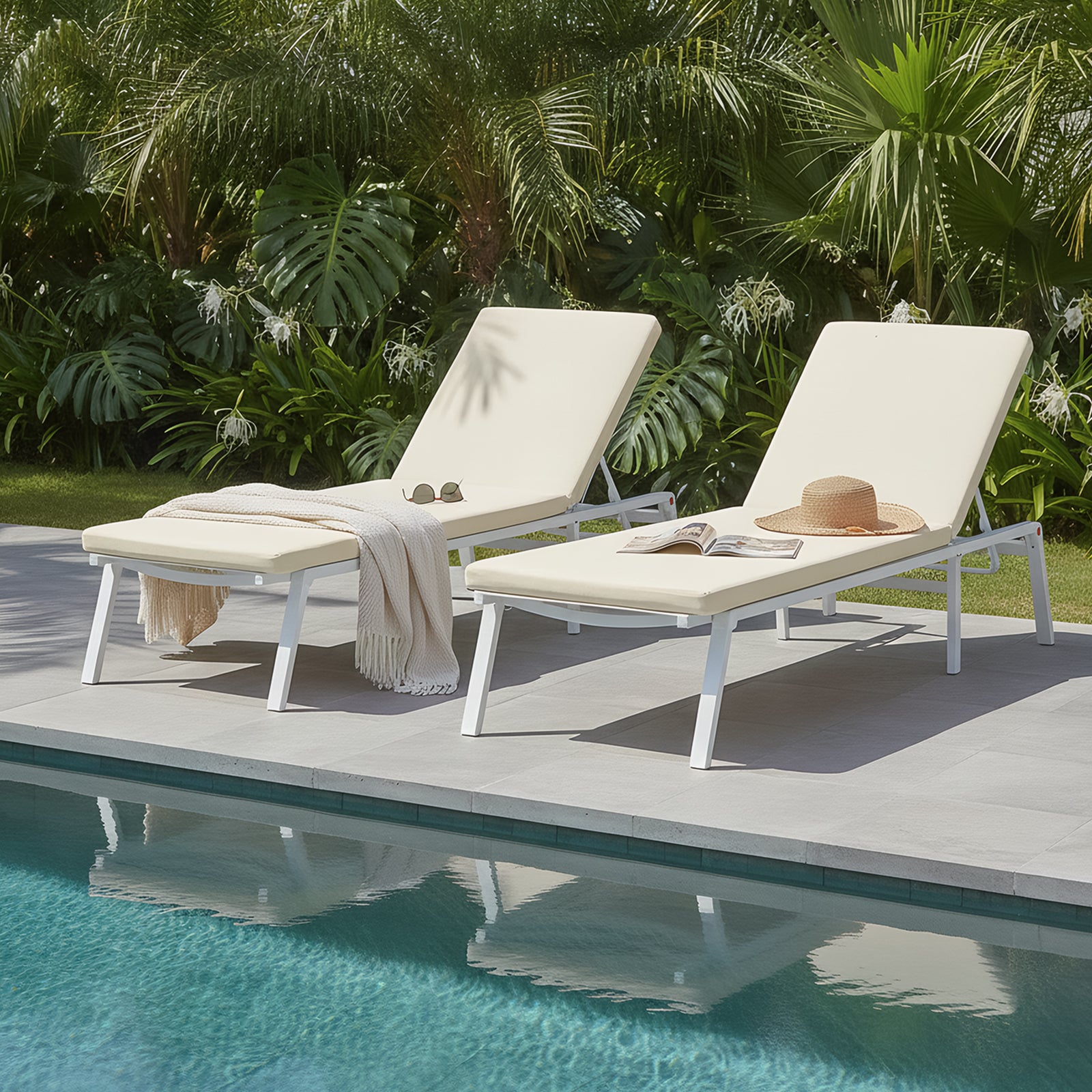 Jabari Outdoor Sun Loungers with Cushions Set of 2 in Cream White by a pool, featuring adjustable metal frames, padded