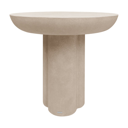 Round concrete outdoor entry table in ivory with curved pedestal base, front view