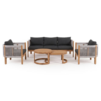 Modern outdoor furniture set on a white background with sofa, chairs, and coffee tables