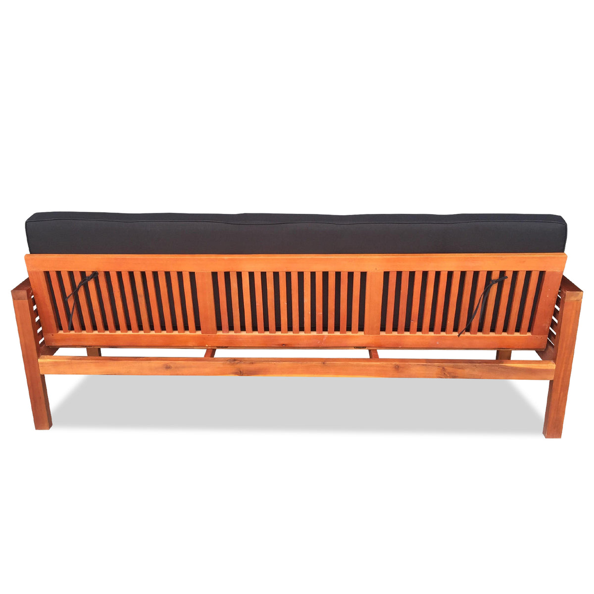 Luxo Meves Timber Outdoor Sofa Bed Black, featuring a wooden frame with a black cushion, transforms from a stylish bench to a sun lounge bed with foldable backrest and round pillows.