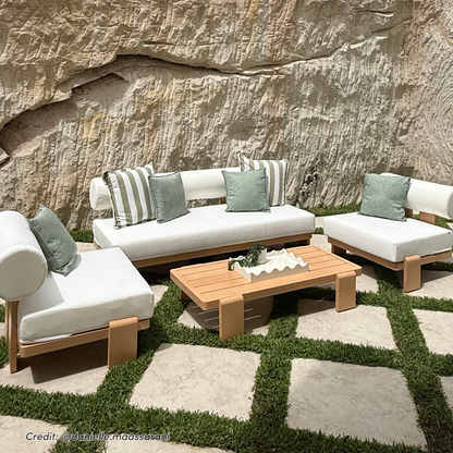 Modica 5 Seater Aluminium Outdoor Sofa Set in White with light wood frame, white cushions, green and striped pillows, slatted