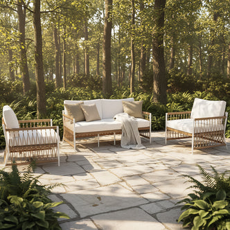 Nuevo 4 Seater Wicker Outdoor Lounge Set in Light Beige, featuring a two-seater sofa with white cushions and natural rope