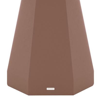 Close-up of the flared concrete base of the Orson dining table in Mocha Mousse, featuring a small "LUXO Outdoors" badge