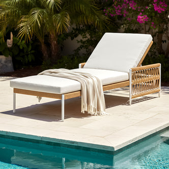 Sibutu Wicker Outdoor Sun Lounger in Light Beige with white metal frame, tan woven rope sides, white cushion, and matching