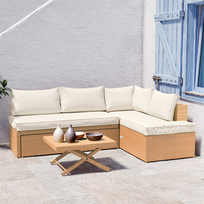 Tybee 4 Seater Rattan Outdoor Sofa Set in Cream White features a light-wicker L-shaped design with off-white cushions, a matching wicker coffee table, and decorative vases, set on light stone pavers.