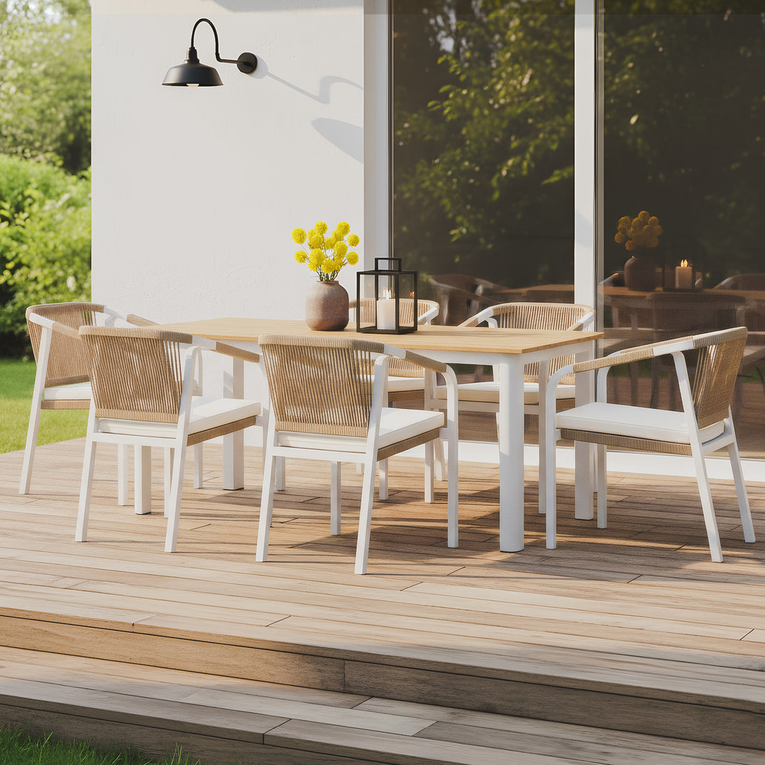7-piece outdoor dining set with a timber-top table and six white aluminum chairs featuring grey rope-woven backs and charcoal cushions.