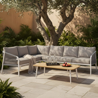 Vernon 6 Seater Aluminium Outdoor Lounge Set in Grey with curved sectional sofa, light grey cushions, white frame, and wooden