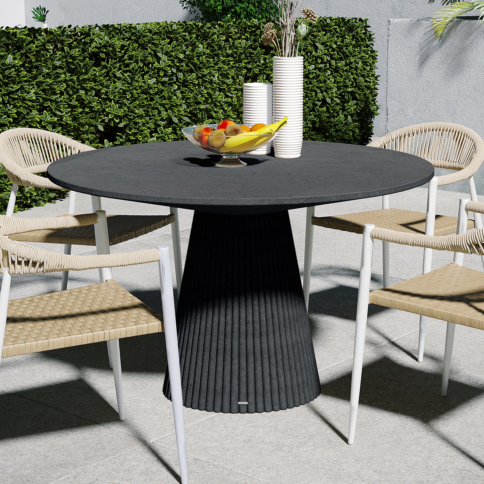 Xander 120cm Fluted Outdoor Concrete Dining Table Grey Marble, shown on a stone-tiled patio with four white-framed chairs
