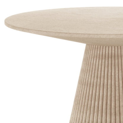 Close-up of the round top and fluted pedestal base of the Xander 120cm Outdoor Concrete Dining Table in Ivory