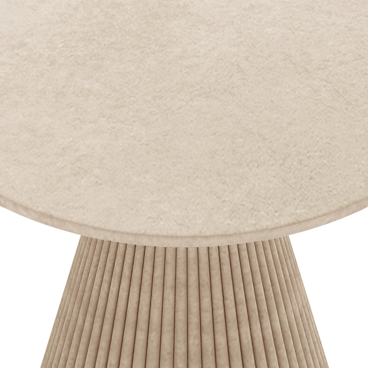 Close-up of the round ivory concrete tabletop and fluted pedestal base of the Xander 120cm outdoor dining table
