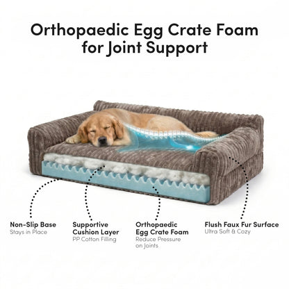 Golden retriever resting on brown corduroy orthopaedic dog bed with egg crate foam layers visible