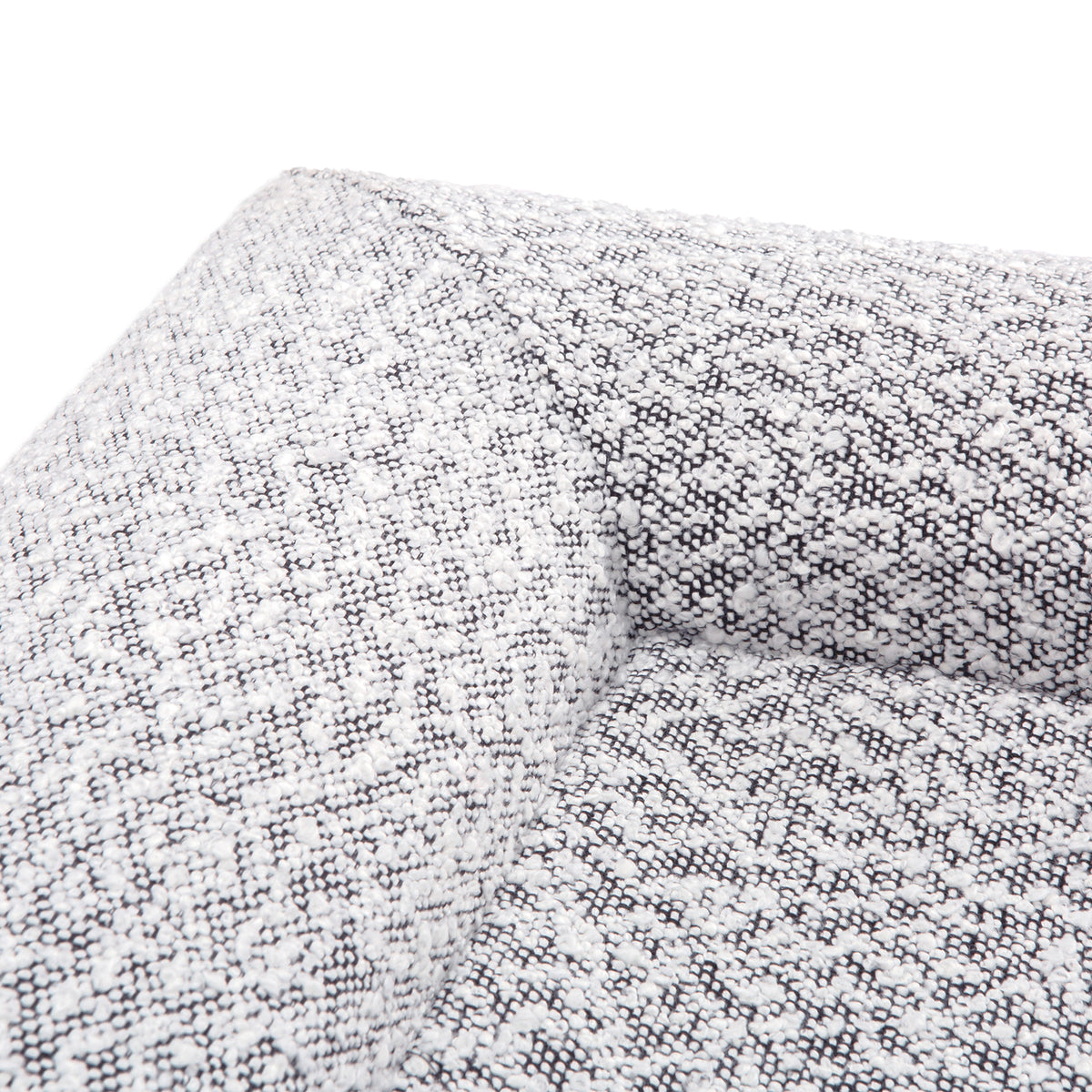 Close-up of the Tyro Luxe Medium Orthopedic Pet Bed showcasing its textured boucle cover and supportive orthopedic memory foam, designed for medium-sized pets seeking comfort and joint relief.