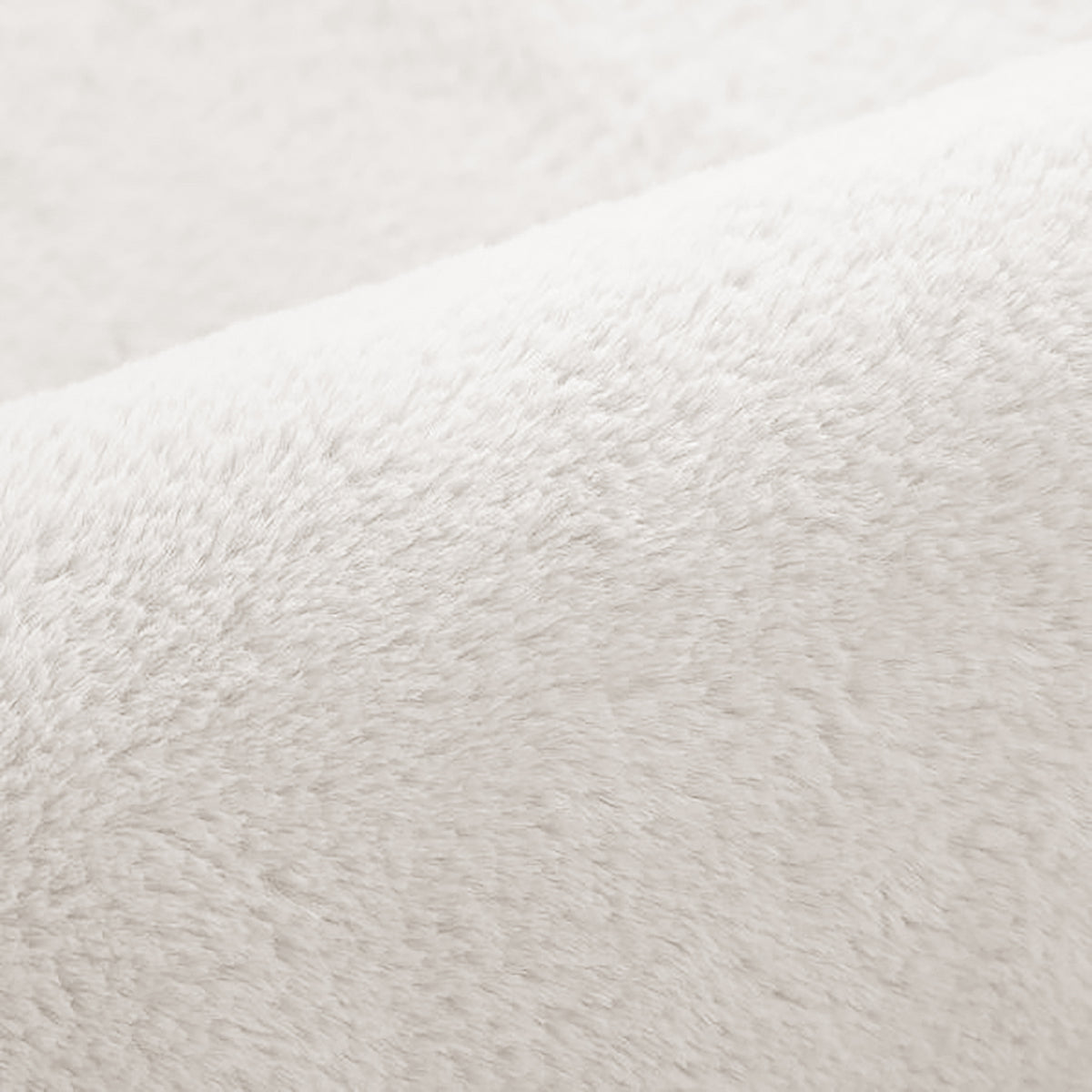 Close-up of the soft, plush surface of the Azaliya 200x300cm Faux Rabbit Fur Floor Rug in Cream White, highlighting its luxurious texture and cozy, napped fibers.