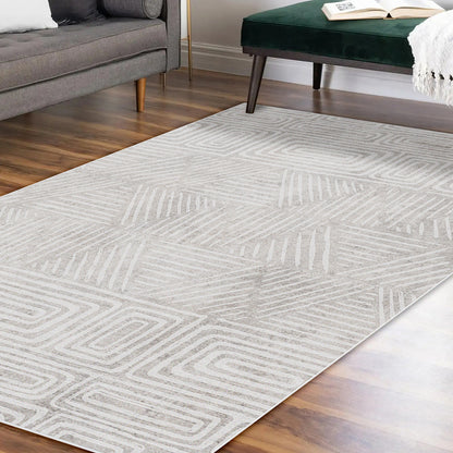 Duved 200x300cm Large Contemporary Indoor Floor Rug on hardwood flooring, featuring a geometric pattern. Partially shown: gray sofa, dark green bench with white throw, and an open book.