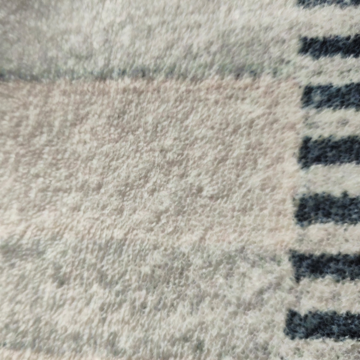 Elimas Soft Contemporary Printed Rug 160x230cm showcases a close-up of its textured surface, highlighting the soft 12mm pile and intricate modern pattern, designed for comfort and style in any room.