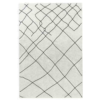 Melody Black & White Modern Rug 120x170cm showcases black abstract lines on an ivory surface, embodying a Scandinavian-inspired design ideal for complementing vibrant furniture with its subtle and timeless aesthetic.