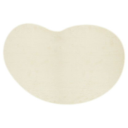 Parna Curved 300x400cm Large Shag Rug in Beige, featuring a plush, U-shaped design with a deep pile, ideal for cozy, modern interiors.