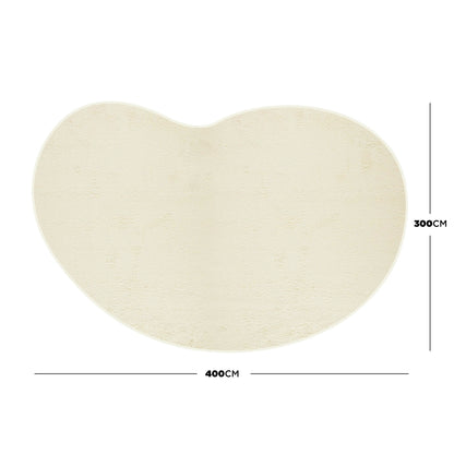 Parna Curved 300x400cm Large Soft Rug in Beige, featuring an organic kidney shape with plush texture