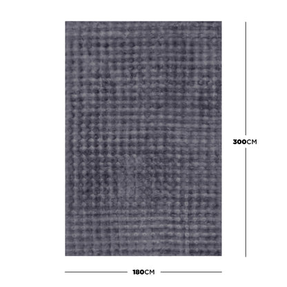 Severa 180x300cm Fluffy Fur Textured Bubble Rug Grey, featuring a rectangular dark-gray waffle-textured design, displayed flat with dimension lines indicating 180 cm width and 300 cm height against a white background. - Dimensions