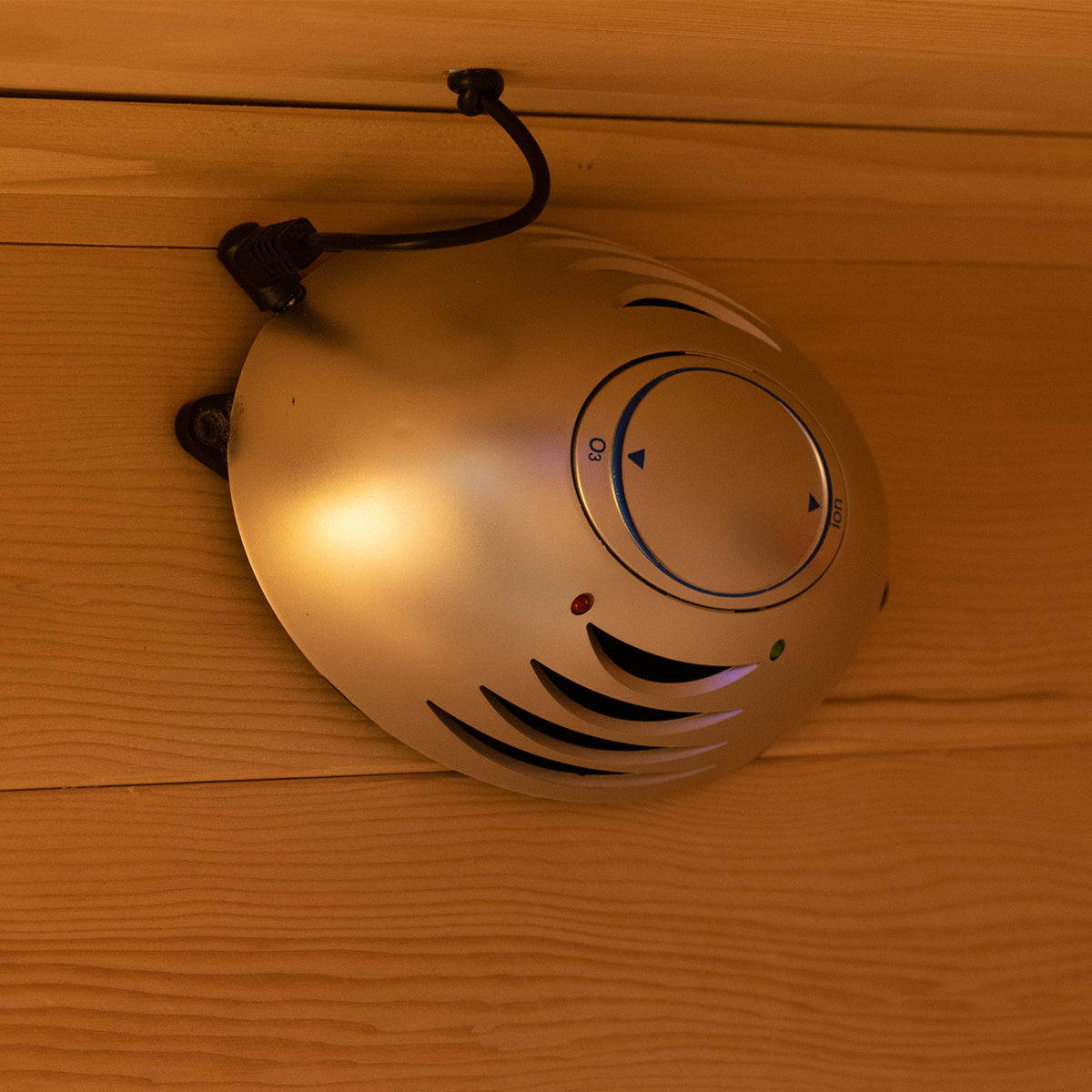 Harlow 2 Person Canadian Hemlock Infrared Home Sauna, wall-mounted with ozone/ion generator, adjustable dial, airflow vents, and LED indicators; designed for a relaxing wellness space at home.