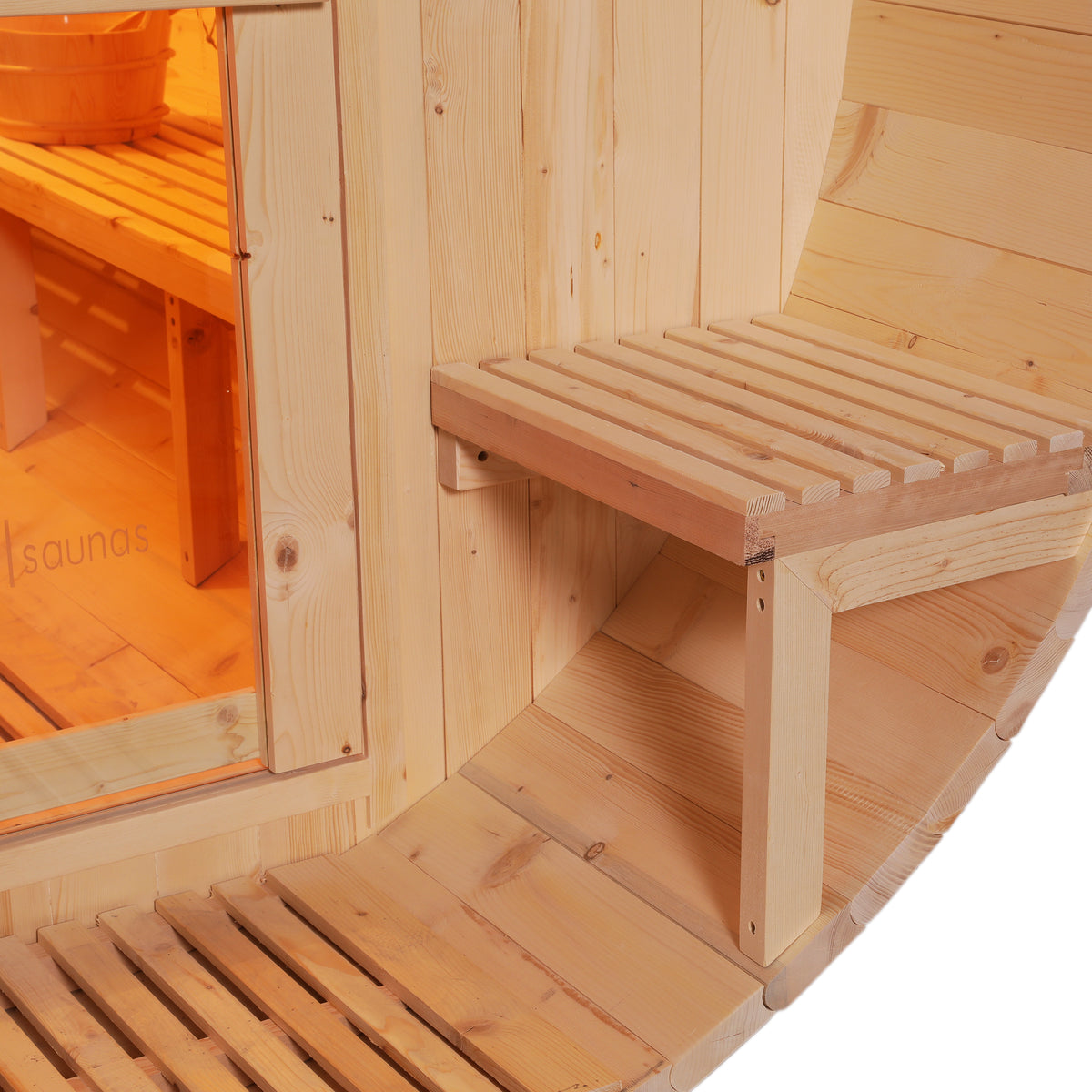 Luola 2 Person Pine Outdoor Barrel Sauna & Harvia Stove features light timber paneling, a slatted folding bench, and a wooden sauna bucket, viewed through a glass door in a cozy, barrel-style design.