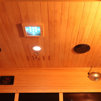 Valo 3 Person Carbon Fibre Infrared Indoor Sauna featuring a tongue-and-groove wooden ceiling, LED lights, a temperature sensor, ventilation slots, digital control panel, and internal speaker for a luxurious home spa experience.