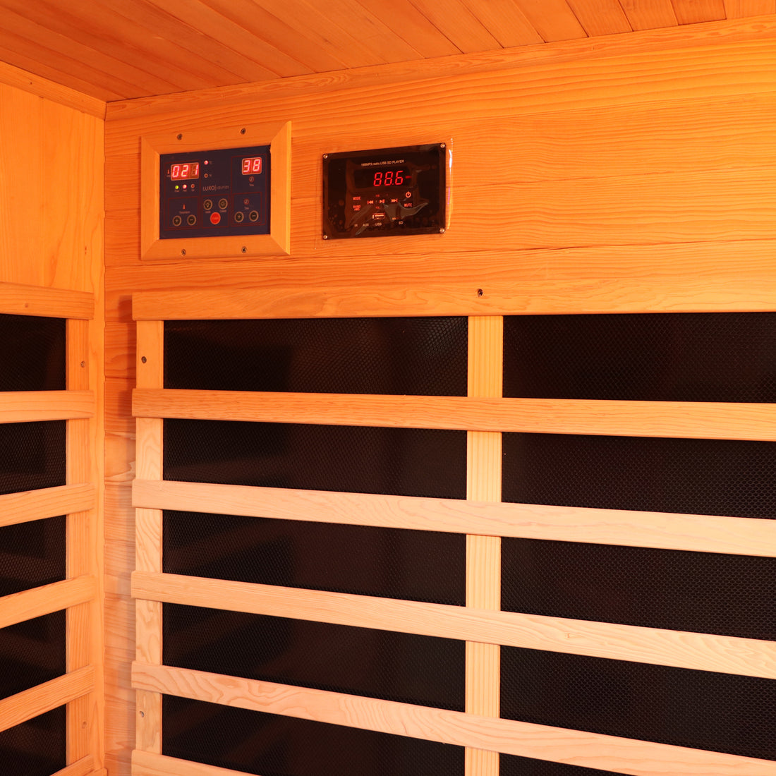 Valo 3-Person Infrared Home Sauna featuring a close-up view of Canadian Hemlock wood panels, showcasing its smooth texture and luxurious design intended for indoor relaxation and therapeutic benefits.