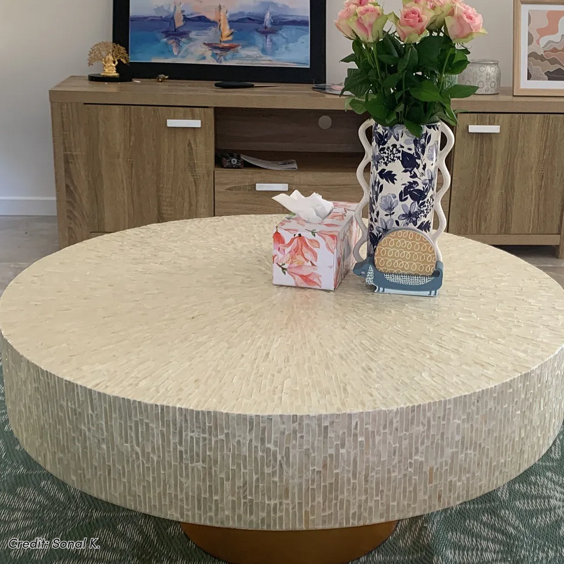 Abelene round mother of pearl coffee table with cream mosaic top and gold base