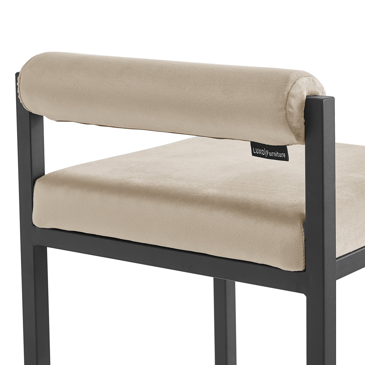 Close-up of the Aivy Velvet Bar Stool - Set of 2, showcasing the plush foam padding and sleek black metal frame with a built-in footrest, embodying modern design and comfort.