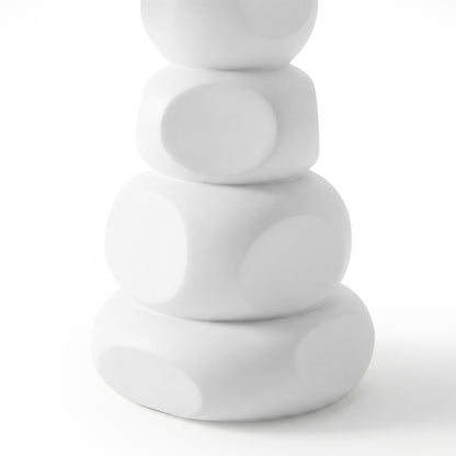 Close-up of stacked rounded white concrete base of outdoor dining table