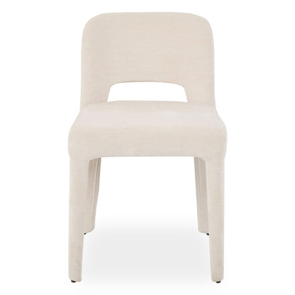 Edris upholstered dining chair in oat with curved backrest, cut-out detail and fabric-covered legs